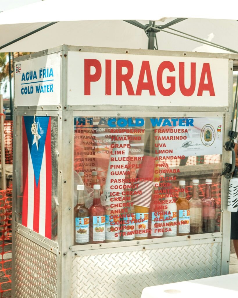 Piragua stand (Puerto Rican snow cone) in Puerto Rican colors with a Puerto Rican flag on the side of it