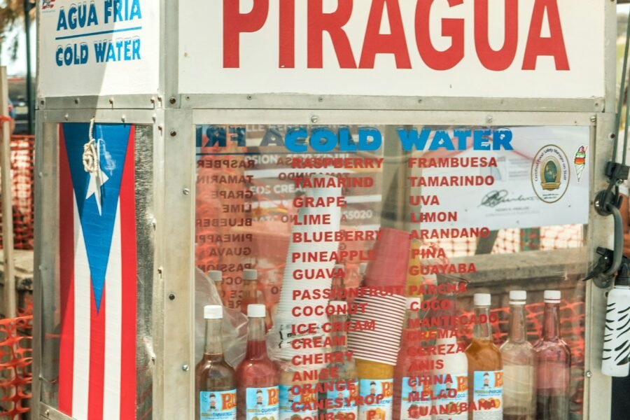 Piragua stand (Puerto Rican snow cone) in Puerto Rican colors with a Puerto Rican flag on the side of it